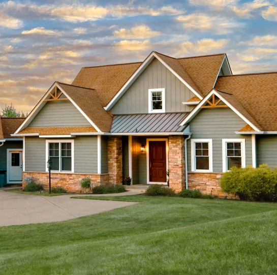 A home with an extensive driveway and a prominent garage space.